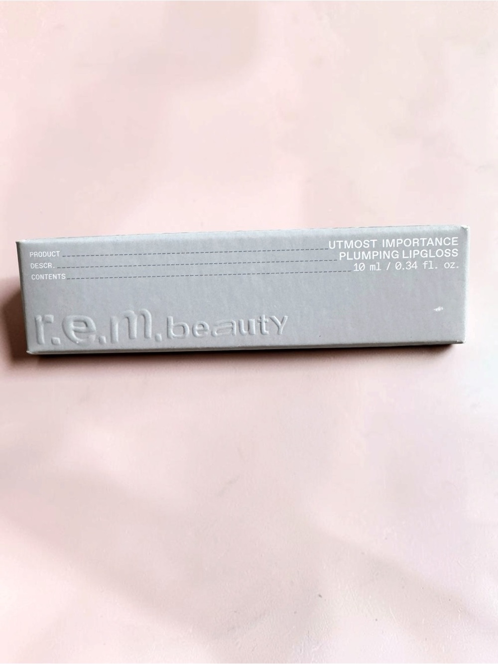 r.e.m. beauty Utmost Importance Plumping Lipgloss —Translucent NIB